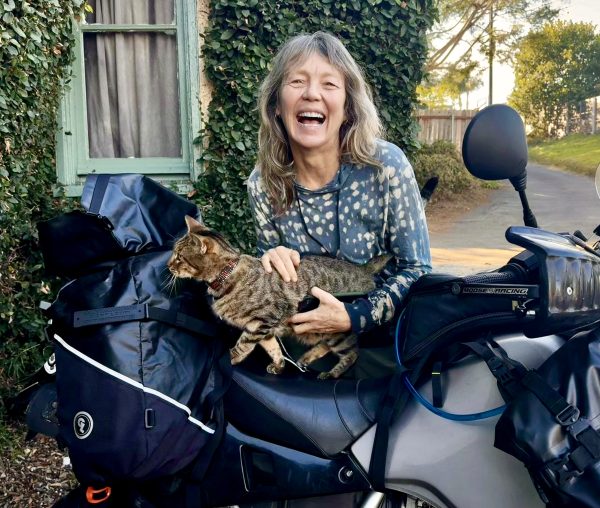 Carla King and Allan Karl with Dar the cat on Carla's KLR650, on her way to explore Baja.